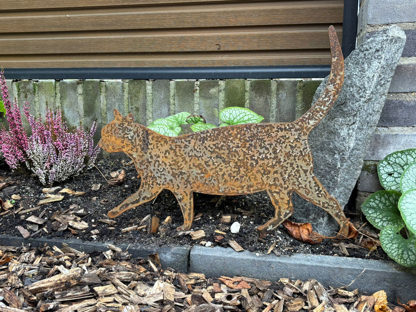 Poes lopend tuinprikker